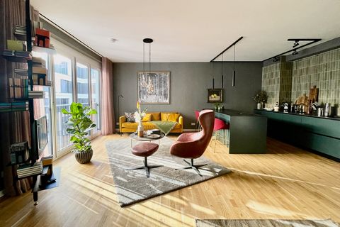 The apartment was furnished and equipped by an interior designer and some stylish and characterful personal pieces of the owner were added. The color scheme is exceptional and well combined. The living room has huge sliding doors, that can be opened ...