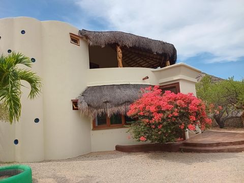 Casa El Arco in Cabo Pulmo is a 2 bedroom 2 1 2 bathroom sustainable home in Cabo Pulmo steps away from the world renowned Marine Park. This two storey house offers spectacular mountain and ocean views in a tranquil neighborhood and surrounded by sem...