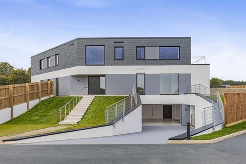 Welcome to your dream home! This stunning new build eco home, designed to the highest standards, offers a harmonious blend of modern luxury and environmental sustainability. Nestled on a generous 0.6-acre plot, the property features seven beautifully...