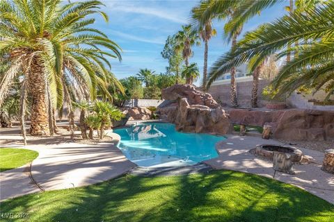 *RESORT STYLE POOL* Exquisitely remodeled 4-bedroom residence with a sparkling OASIS like saltwater pool and RV parking, nestled in the heart of prestigious Green Valley. This sophisticated home offers an open, airy layout with soaring vaulted ceilin...