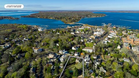 An historic house with approved plans for a substantial addition by world renowned designer Steven Gambrel, and one of the largest residential parcels within this location of Sag Harbor Village. A three quarter (.75 acre) site with mature landscaping...