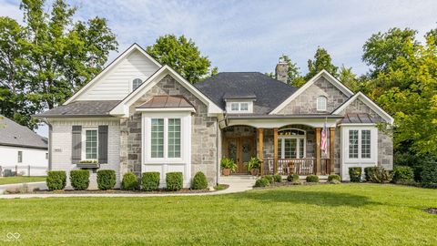 Discover refined living in this exceptional custom ranch, perfectly situated on a picturesque lot in the sought after Stonebriar community. Thoughtfully designed, the welcoming entry leads into a dramatic great room with a soaring 13' coffered ceilin...