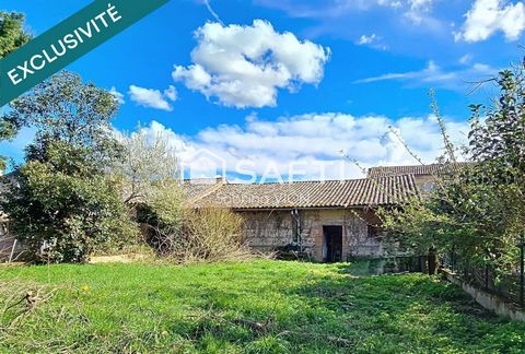 MAISON DE VILLE AVEC GRAND GARAGE ATTENANT ET JARDIN