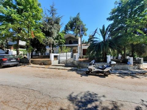 Ekali in a quiet place with a view, remarkable detached house of 650 sqm that needs total renovation, two main levels built on a plot of 1086 sq.m., with a large surrounding area-garden. On the first level comfortable reception area, living room fire...