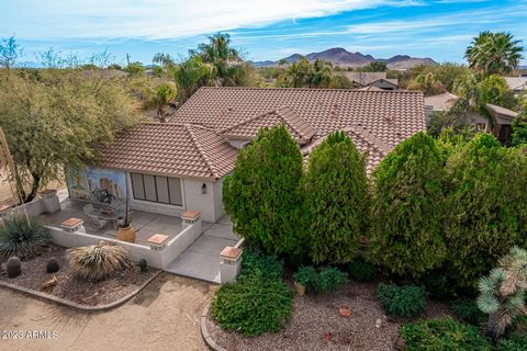 Welcome to your Desert Oasis! This stunning home starts off with a private gate, found both in the front and back of the property. This custom house was built with luxury and relaxation in mind. Look out onto this stunning patio space complete with P...