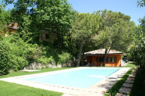 This secluded holiday home is in Garda, Venice. The beautiful property has 3 bedrooms, a shared swimming pool, and a roofed terrace to offer an amazing break from your daily routines. It can host up to 6 guests and is ideal for families or small grou...