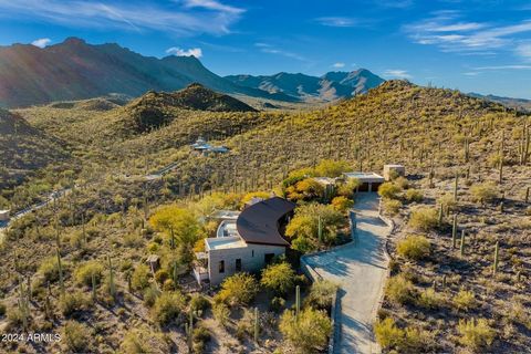 Welcome to your very own private 'resort' hidden at the end of the road in secluded (but accessible) Chaos Canyon. The structures on the property are built like a fortress (steel roof, split-face block and steel frame structures with interior real pl...