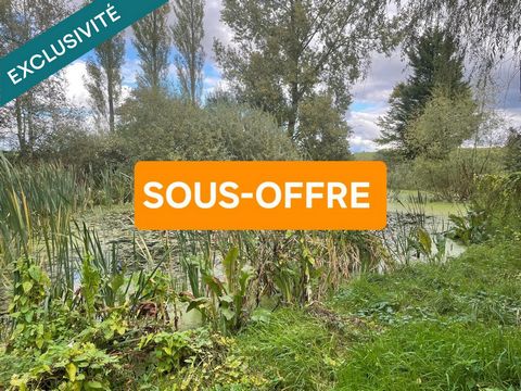 Mangiennes :terrain de loisirs 10323m² avec étang