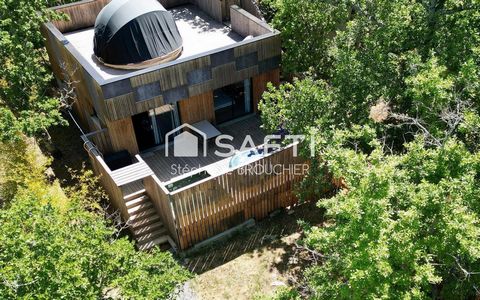 Ensemble immobilier avec maison et hébergement atypique