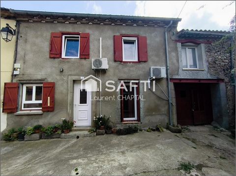 Maison de village avec remise attenante.