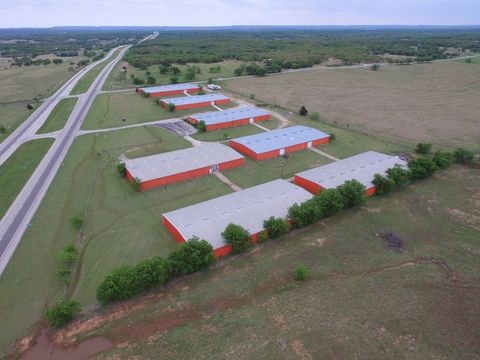 Texas Country location on U.S. Highway 82, 2 Miles East of Nocona, TX. In Montague County. Traffic count high is 3,867 vehicles a day. 7 (Approx.) 20,000 K Warehouses on 11.92 Acres. Details on each warehouse is located in the offering memorandum. Pl...