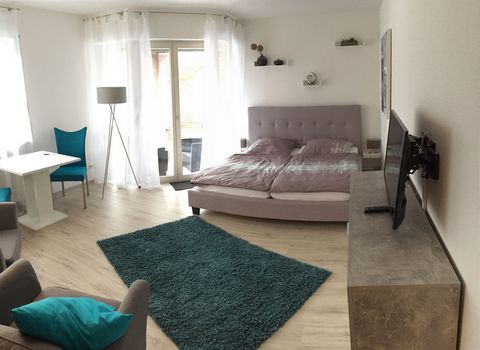 The bright, well-designed 1-room apartment (32 m²) on the ground floor of an apartment building has a high quality and new equipment: - laminate floor - large balcony - double bed (1.80 m) - spacious wardrobe - 2 comfortable armchairs with side table...