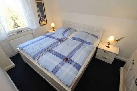 Cozy Greetjehaus in Dornumersiel with space for up to 6 people. Relax on the terrace or explore the area. The holiday accommodation has 3 bedrooms, a bathroom with rain shower and toilet, a fully equipped kitchen and a beautiful living and dining are...