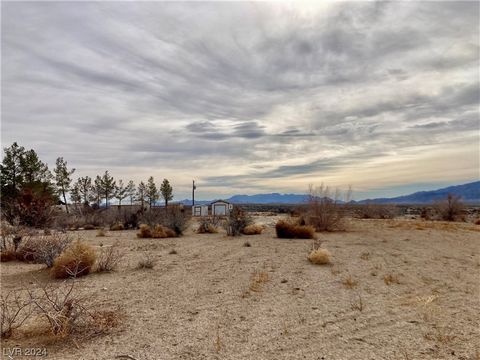 Spectacular lot that borders BLM land! Panoramic mountain views and open spaces abound! Well on property with a pump shed, septic system installed, electric box on property, and propane connections ready to be connected! There's also an additional st...