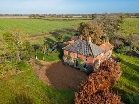 Nestled comfortably in its surroundings, this property has a handsome Georgian frontage and a generous plot of around 3.3 ACRES with tennis court, PADDOCK and woodland. Once a pair of small cottages, it’s been totally transformed with lots of charact...