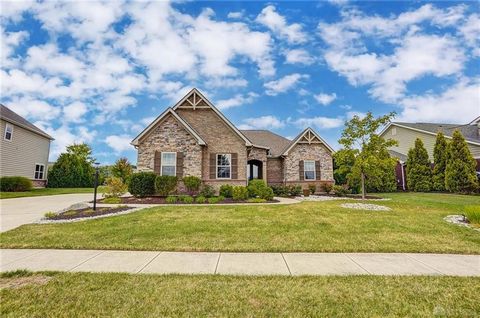 Nestled within the highly coveted Soraya Farms community in Clearcreek Township, this meticulously crafted custom home stands as a testament to exquisite design and timeless charm. As you step through the elegant 8' tall French doors, complete with a...