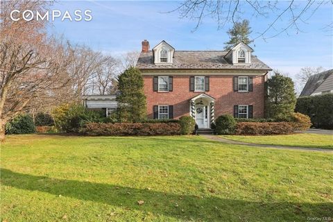 This stunning Georgian brick residence is a Scarsdale classic. Sumptuously appointed and completed with distinctive architecture including a slate roof and its interior is defined by exquisite period detailing, contemporary elegance, and the finest f...