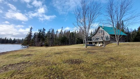 Experience Cape Breton living in this charming 5-bedroom, 2-bathroom, 1.5-storey cedar log home on a scenic 13597 m2 south-facing lot, offering 98 m frontage on the Bras d'Or Lake. Relax on the spacious wrap-around deck with stunning water views. The...