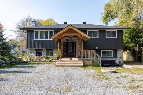 Welcome to your private 3/4 of an acre oasis! Enter through the custom stone entry gates and elegant wrought iron fencing to discover this beautifully renovated Raised Bungalow. You are greeted by a striking timber-framed entrance that flows seamless...