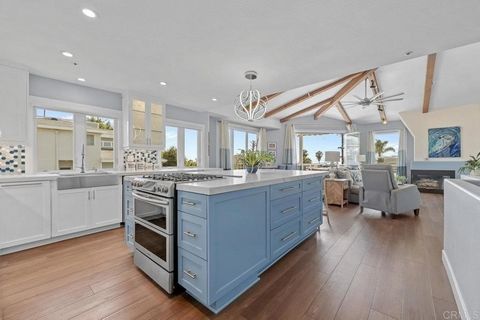 Welcome to coastal luxury in the heart of Cardiff! This stunning home offers 2,200 square feet of beautifully upgraded living space with panoramic ocean views from two levels, extending all the way to La Jolla. Just four blocks from Cardiff’s pristin...