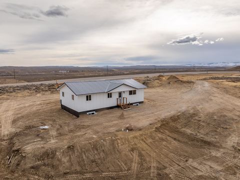 Clean and updated remodel just 7 miles from the beautiful town of Lander, Wyoming! This three bedroom and two bathroom home sits on a newly poured foundation and the upper level has been completely updated with modern and tasteful renovations. With a...