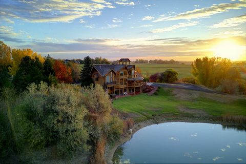 Discover unmatched luxury on 18.82 private acres in Fort Collins, Colorado. This lakeside estate, adjacent to Fossil Creek Reservoir Nature Preserve, features panoramic 360° views of mountains and water, a custom log home with soaring vaulted ceiling...