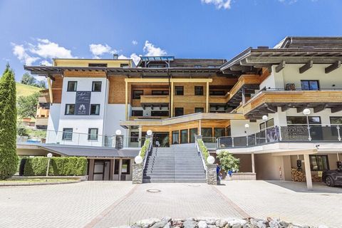 Questo accogliente residence con 2 camere da letto a Saalbach offre 80 m² di spazio abitabile confortevole per un massimo di 6 ospiti. Situata ai piedi della pista da sci, la proprietà offre splendide viste sulle montagne, rendendola un rifugio ideal...