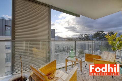 Appartement familial 4 pièces 87 m² avec 3 chambres, 2 balcons et 2 parkings.