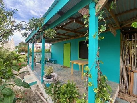 Two bedroom, two bathroom unfinished home with adorable one bed, one bath garden cottage on a quarter acre of land located in Old Wharf, the most sought after residential area in Treasure Beach. Don’t miss this rare opportunity to personalize the fin...