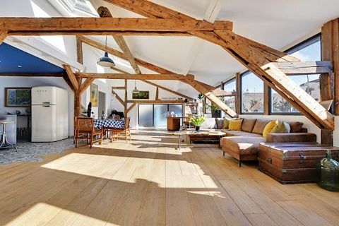 This unique 166 sq m, light filled loft - like home is truly a rare find. Upon entering, you’ll be seduced by the vast living area of 78 sq m with its high ceilings and street lined windows. A primary bedroom and bathroom, as well as a separate laund...