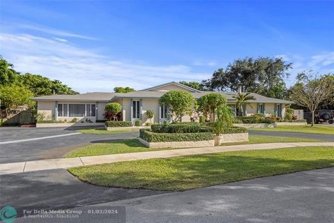 This gracious, versatile home provides a perfect balance for entertainment and privacy. The entry foyer leads to an open living/dining area with a wood burning fireplace, chefs kitchen and family room all opening to the large pool, lanai and oversize...