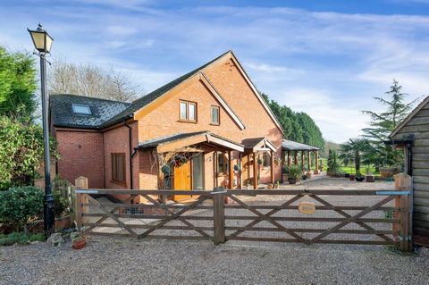 Woodview occupies an idyllic, semi-rural setting within walking distance of the village. Individually built in 2009 and well hidden from the outside world this rare home with uninterrupted field views stands in mature grounds of just under 1 acre. St...