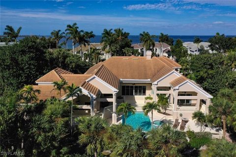 Long fairway and water views with supreme privacy and southern exposure from this distinctive six bedroom home resting on two lots at upper Wulfert in The Sanctuary. Offered below replacement cost, this sprawling home encompasses Florida living at it...