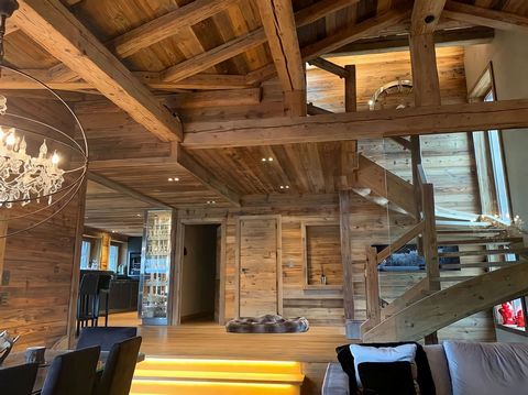 Summary This stunning south facing chalet, located on the Jaillet Hill, is nestled in nature and enjoys magnificent volumes of approx 700 sq.m as well as the most beautiful views of Megeve. It’s built on a plot of approx 1500 sq.m, in a chic and cont...