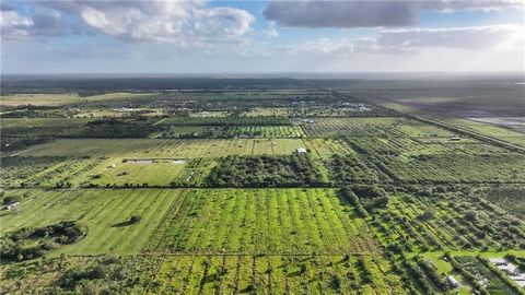 Embrace the rural lifestyle you’ve always dreamed of on this sprawling 10-acre property, perfect for a ranch, farm, or nursery. Nestled close to the Stick Marsh, beaches, and river, you’ll enjoy the best of Florida living with a touch of country char...