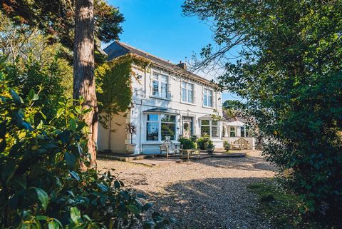 An impressive country house with extensive and versatile accommodation throughout, set in approximately 1.75 acres of grounds and gardens, with an additional 1.3 acre paddock available by separate negotiation, all within two miles of Caernarfon.