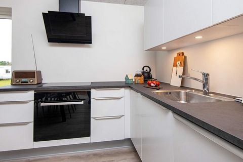 Architect-designed cottage located very close to Kvie Lake in quiet surroundings. Here is plenty of space for two families who are on holiday together. From the house there is not far to a path system where you can get a walk around the lake. The cot...