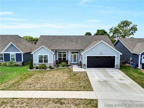 Like-new 3BR, 2BA home in sought-after Ellingsworth Commons, Jeffersonville. Built in 2023, it offers modern style, open layout, and move-in-ready ease. The kitchen features stainless steel appliances, tiled backsplash, pantry, and island flowing int...