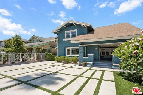 Discover the epitome of California living in this exquisitely remodeled and restored two-story Craftsman home, perfectly situated in the prestigious Mid-Wilshire neighborhood, just minutes from the vibrant energies of Hancock Park, Larchmont Village ...