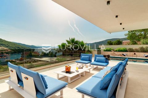 A newly designed luxury villa with three floors offers an incredible blend of elegance and comfort. The villa spans 360m² and includes a heated pool located on the ground floor terrace, with a stunning view of the sea. The terrace is equipped with su...