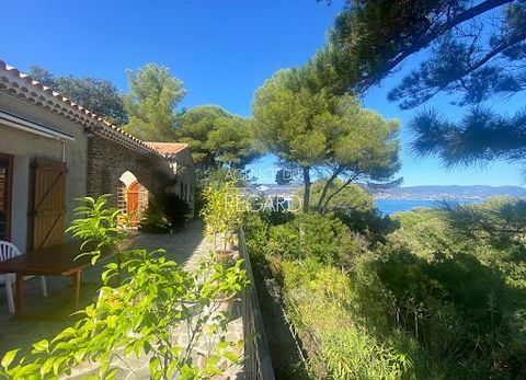 THIS PROPERTY IS UNDER SALE COMPROMISE BY L'AGENCE DU REGARD. In Bormes-les-Mimosas, in the private and guarded domain of Cap Bénat, this property of 1,646sqm offers a seaview to the East. The garden is landscaped with terraces and planted with Medit...