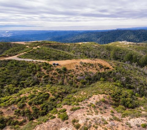 20 acre Ocean View parcel above it all. Fantastic long range top of the world views from Santa Cruz to Big Sur to Watsonville, 20 acres,West facing ridge gated, good road access,, mostly sloped down. Adjoining property is a working vineyard. Recent S...