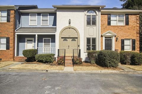 This charming townhome boasts 2 spacious bedrooms, a dedicated home office, and gleaming hardwood floors throughout. Whip up culinary creations in the eat-in kitchen featuring granite countertops, brand new microwave, and sleek appliances. You will n...