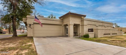 Seeking a spacious townhome with the ultimate guest suite or home office solution? Look no further! This delightful McCormick Ranch property offers the perfect blend of comfortable living and private quarters. The main residence boasts 2 bedrooms, 2 ...