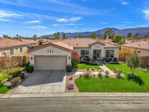 Live behind the gates of coveted Esplanade in desirable North La Quinta! This fabulous home boasts 3 bedrooms + Den/Office (can be 4th bedroom), 2 baths & approx. 2172 SF of open & bright living space. Experience seamless living with a formal living ...