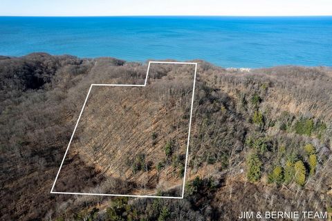 Just north of Saugatuck Dunes State Park, this is a once in a lifetime property! 22+ acres of Lake Michigan property! 330 feet of rare beach frontage could be yours! Enjoy your own natural wonderland; dunes, water, waves, sand, woods, and wildlife al...