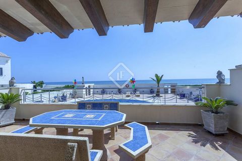 Lucas Fox presents this home with a large swimming pool, an exclusive outdoor area and sea views. The main floor has an entrance hall with high ceilings and wooden beams that leads to a very large living-dining room with a large fireplace and a fully...