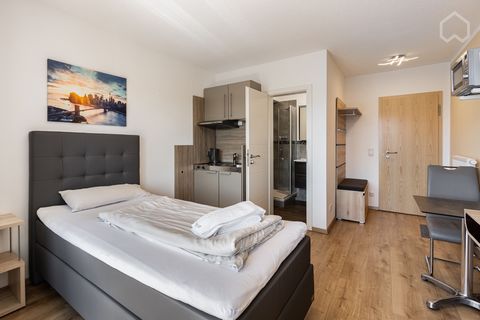 One-room apartment with small kitchenette including refrigerator, sink, two hotplates, microwave, kettle, dishes, cutlery, pots, pan. The apartment of about 17 m² has a TV and a bathroom. Parking spaces are at the house. The bus stop to the S-Bahn is...