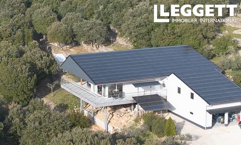 A26812TFO30 - A beautiful contemporary wood and steel construction eco-house in a totally calm setting overlooking superb unspoiled mountain views. This house benefits from a large photovoltaic array on the roof, producing a very important revenue (d...