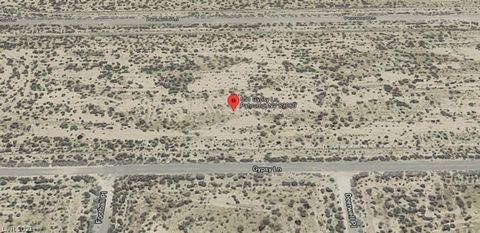 Discover the perfect canvas for your dream home on this spacious residential land situated in the heart of Pahrump, NV. With an 8799 sq ft lot, this parcel offers many possibilities for crafting your ideal oasis in this peaceful and serene neighborho...